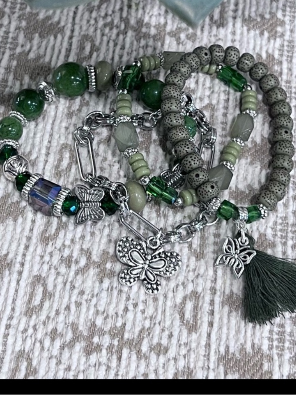 NWOT - Beautiful emerald green, set of four butterfly charm bracelets